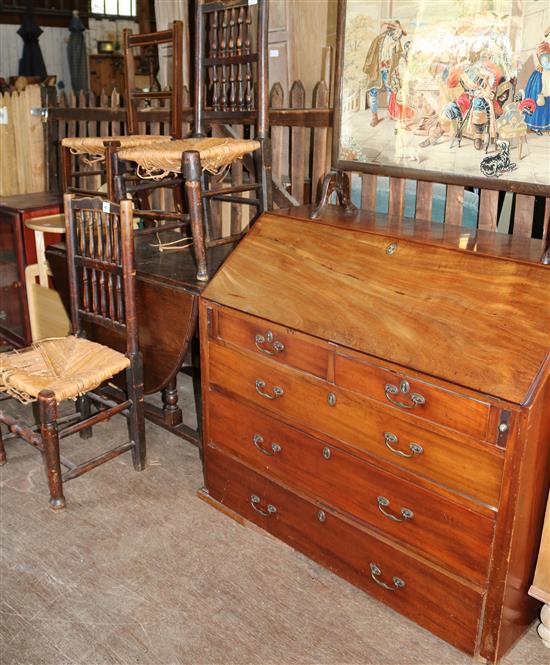3 rush seated spindle back chairs